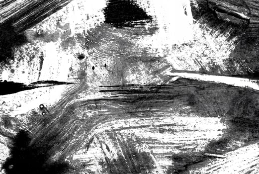Abstract black and white grunge texture with rough brush strokes and splatters, ideal for backgrounds or artistic designs. photo