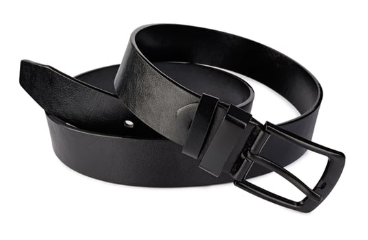 Black leather belt isolated on a white background. photo