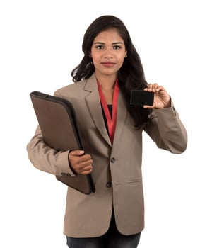 Smiling business woman holding a blank business card or ID card over white background photo