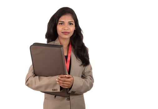 Young happy business woman holding folder photo