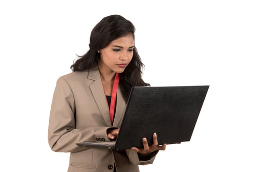 Young happy smiling woman holding laptop. photo