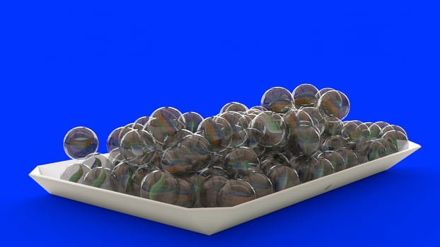 Glass Marbles with blue background photo