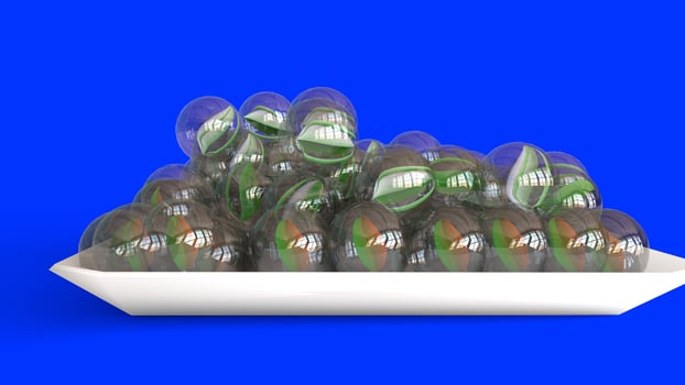 Glass Marbles with blue background photo