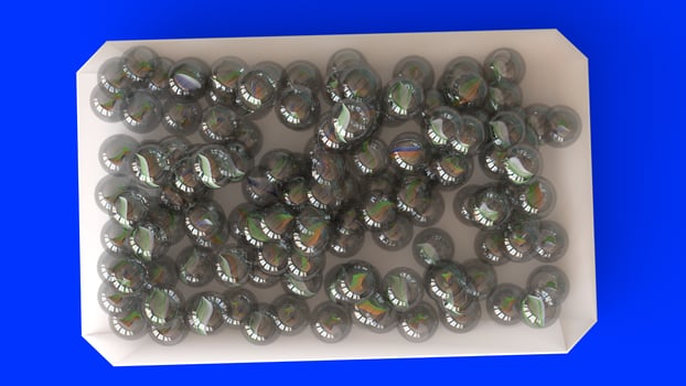 Glass Marbles with blue background photo