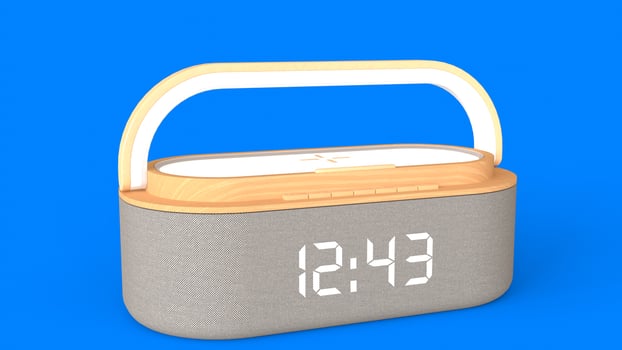 wireless alarm clock with blue background photo