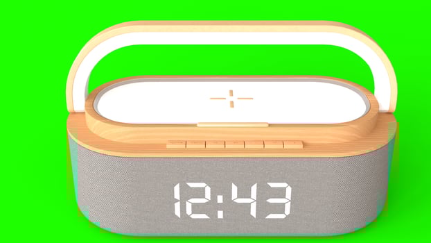 wireless alarm clock with green background photo