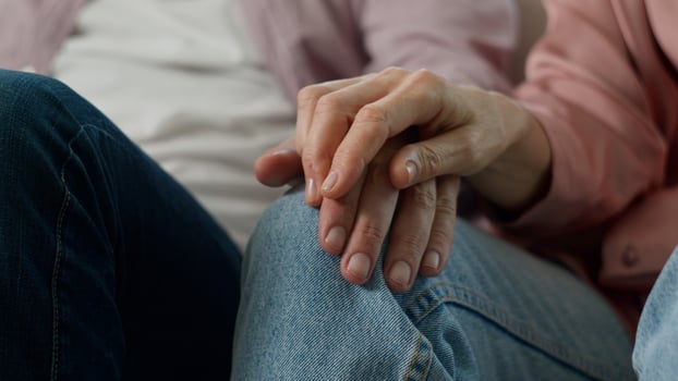 Close-up unrecognizable elderly old people holding hands with wrinkles mature married couple man woman pensioners loving senior husband wife feeling love caring support happy together in relationship photo