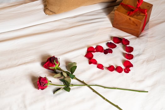 Romantic Setup with Roses and Gift Box photo