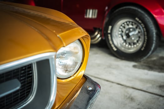 Classic Vintage Cars Showcased in an Indoor Garage Setting With Attention to Detail photo