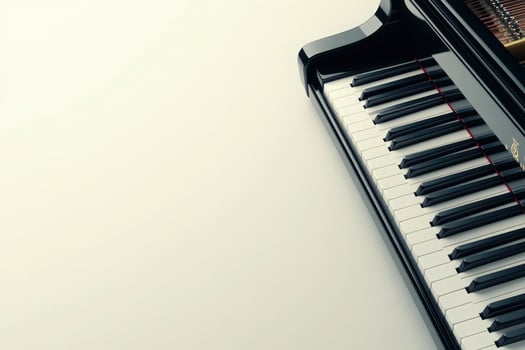 The grand piano keys are displayed prominently on a clean, solid background, showcasing their polished finish and inviting touch. This composition emphasizes the beauty of the instruments design. photo