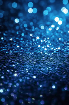 Sparkling blue glitter background creates a vibrant atmosphere for creative projects and design photo