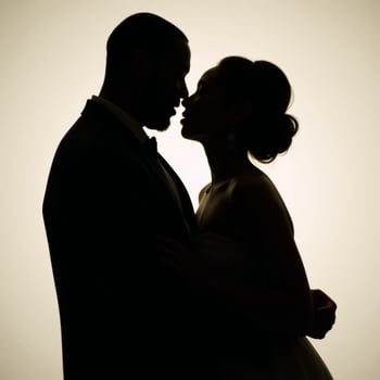 An African American silhouette of two people photo