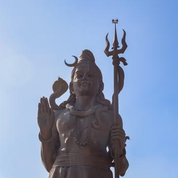 Big statue of Lord Shiv near Delhi International airport, Delhi, India, Lord Shiv big statue touching sky at main highway Mahipalpur, Delhi photo