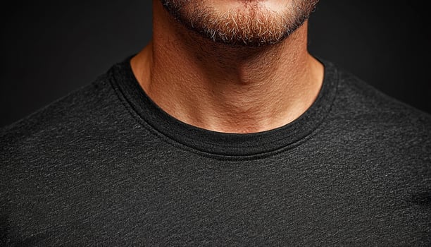Confident adult man with beard looking at camera generated by AI photo