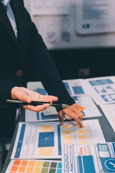 The designer team is designing the uxui system to make the uxui system work well on new phones and support system updates. Website development concept UI UX front end designer photo