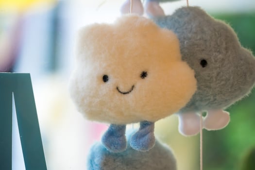 Baby Mobile with Smiling Clouds at Nonthaburii, Thailand. photo