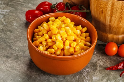 Sweet canned ripe corn grain photo