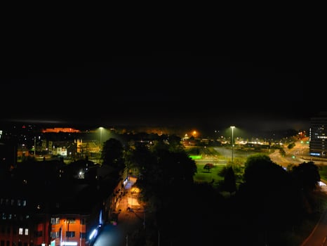 Aerial View of Illuminated Historical Central Coventry City Centre Downtown of England United Kingdom. Night view Captured on After Midnight with Drone's Camera on October 23rd, 2024 photo