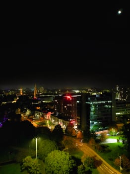 High Angle View of Illuminated Historical Central Coventry City Centre Downtown of England United Kingdom. Aerial footage Was Captured on After Midnight with Drone's Camera on October 23rd, 2024 photo