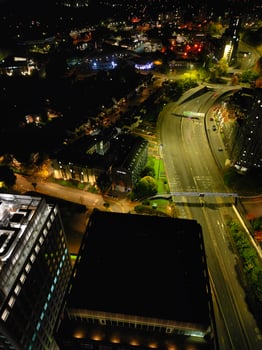 High Angle View of Illuminated Historical Central Coventry City Centre Downtown of England United Kingdom. Aerial footage Was Captured on After Midnight with Drone's Camera on October 23rd, 2024 photo