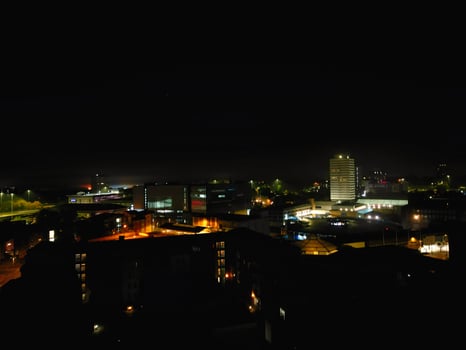 High Angle View of Illuminated Historical Central Coventry City Centre Downtown of England United Kingdom. Aerial footage Was Captured on After Midnight with Drone's Camera on October 23rd, 2024 photo