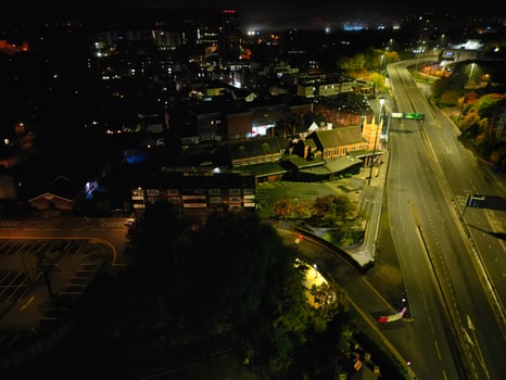 High Angle View of Illuminated Historical Central Coventry City Centre Downtown of England United Kingdom. Aerial footage Was Captured on After Midnight with Drone's Camera on October 23rd, 2024 photo