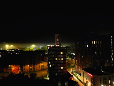 High Angle View of Illuminated Historical Central Coventry City Centre Downtown of England United Kingdom. Aerial footage Was Captured on After Midnight with Drone's Camera on October 23rd, 2024 photo