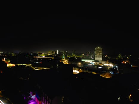High Angle View of Illuminated Historical Central Coventry City Centre Downtown of England United Kingdom. Aerial footage Was Captured on After Midnight with Drone's Camera on October 23rd, 2024 photo