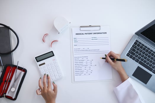 woman consults dentist about her toothache for treatment in dental clinic and dentist gives advice on right symptoms and treatment method for patient. concept consulting dentist about dental treatment photo