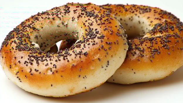 Soft and chewy poppy seed bagels glisten with freshness, perfect for breakfast photo