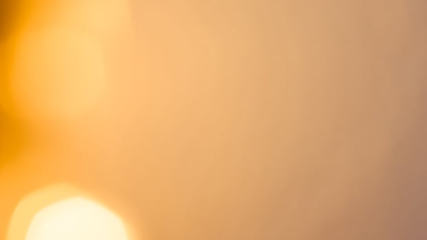 Bright golden bokeh lights create a vibrant and festive holiday background photo
