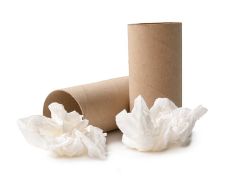 Side view of screwed or crumpled white tissue paper ball with cores in stack isolated on white background with clipping path photo