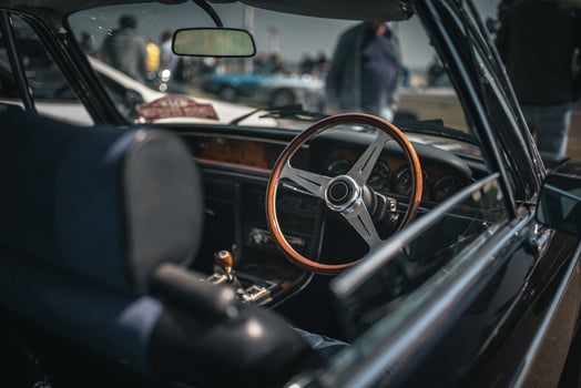 Interior of a luxury, classic car on a motor show. photo