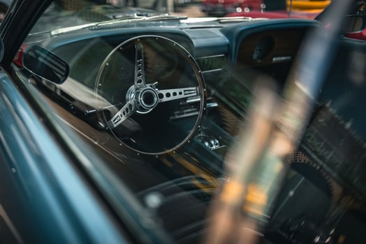 Interior of a luxury, classic car on a motor show. photo