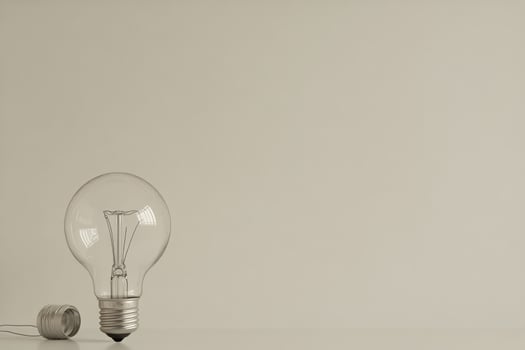 A clearly designed light bulb showcasing its filament and simple wiring for modern illumination photo