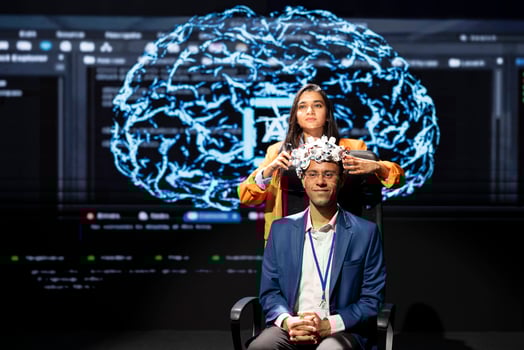 Experts speaking at tech event, explaining impact of neural implants and artificial intelligence technology. Neuroscience researchers present risks and threats associated with AI during experiment photo