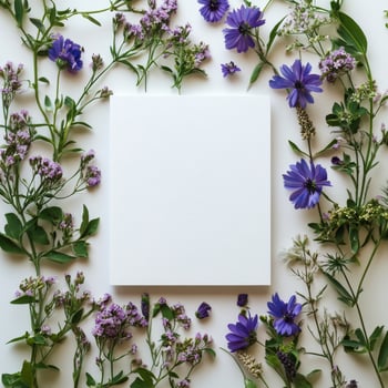 Elegant arrangement of purple flowers and blank space for creative projects on white background photo