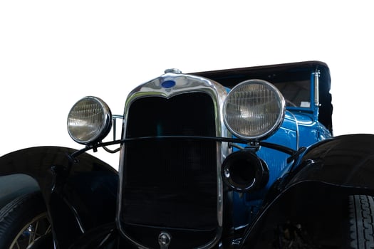 Old, vintage car with chrome headlights. photo