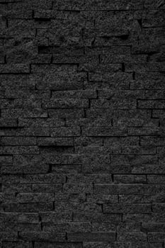 Gray wall of rough brick. Abstract construction background. photo