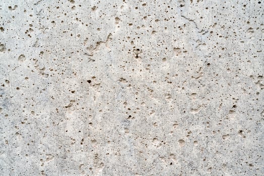 The rough wall of the house. The texture of cement. photo