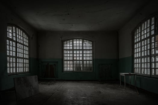 Inside old Orlovka Asylum for the insane in Voronezh Region. Dark creepy abandoned mental hospital photo