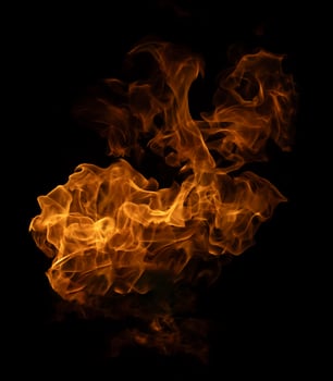 Fire and burning flame of explosive fireball isolated on dark background for abstract graphic design photo