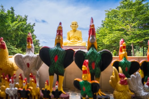 Iconic Golden Monk Statue in Thai Temple at Ayutthaya, Thailand. photo