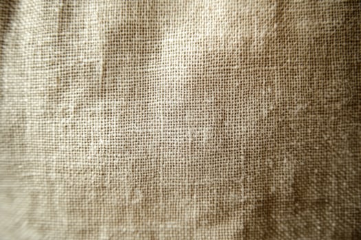 A closeup, detailed view of an exquisite, soft, natural linen fabric that highlights its unique texture and weave photo