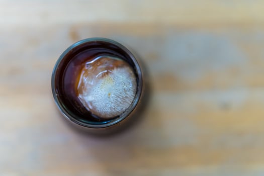 Black coffee with ice in glass photo