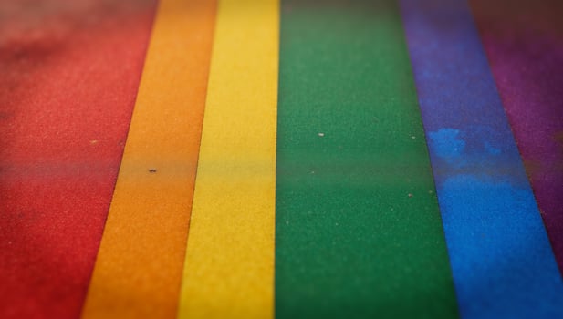 A grungystyle rainbow flag emblematic of LGBTQ Pride photo