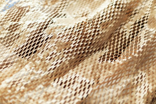 Eco friendly brown paper honeycomb wrap for product packaging parcel carton box photo