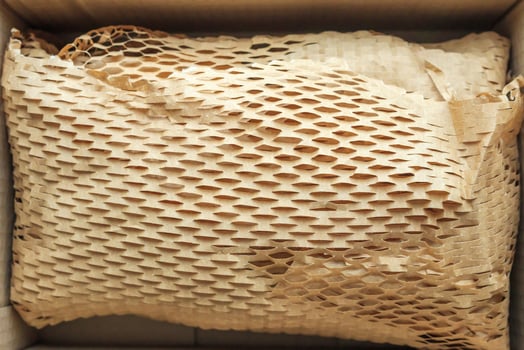 Eco friendly brown paper honeycomb wrap for product packaging parcel carton box photo