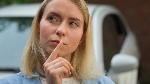 Pensive Caucasian businesswoman puzzled female driver dream lady portrait woman girl thinking about buying new automobile car buyer pondering transport decision in city wonder auto rent credit problem photo