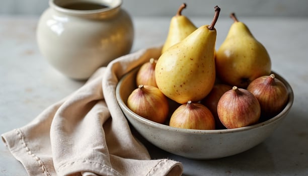 A bowl of pears and figs on a table photo